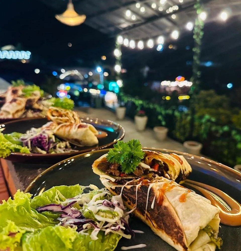 Dinner served on the terrace at Rock View Hostel Ella