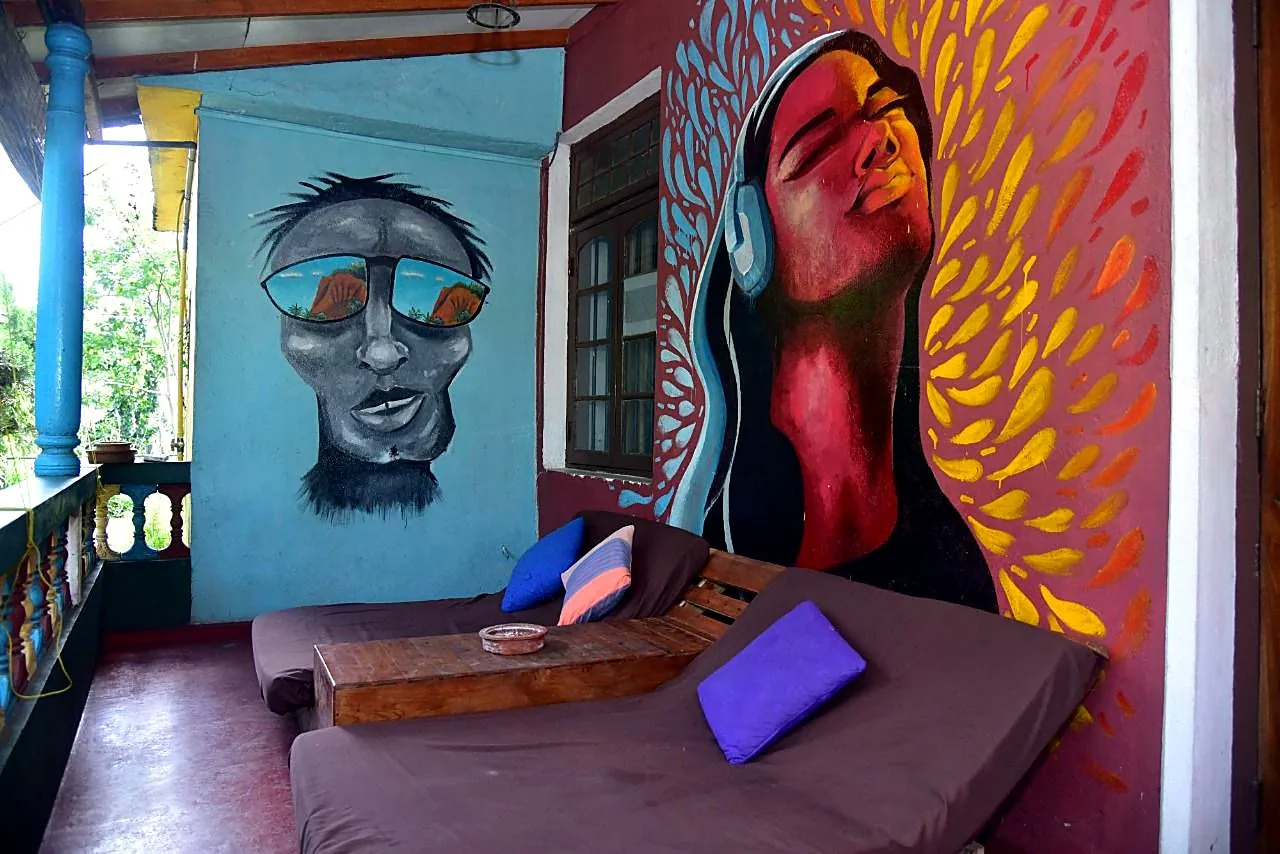 The hand-painted mural lounge at Rock View Hostel Ella